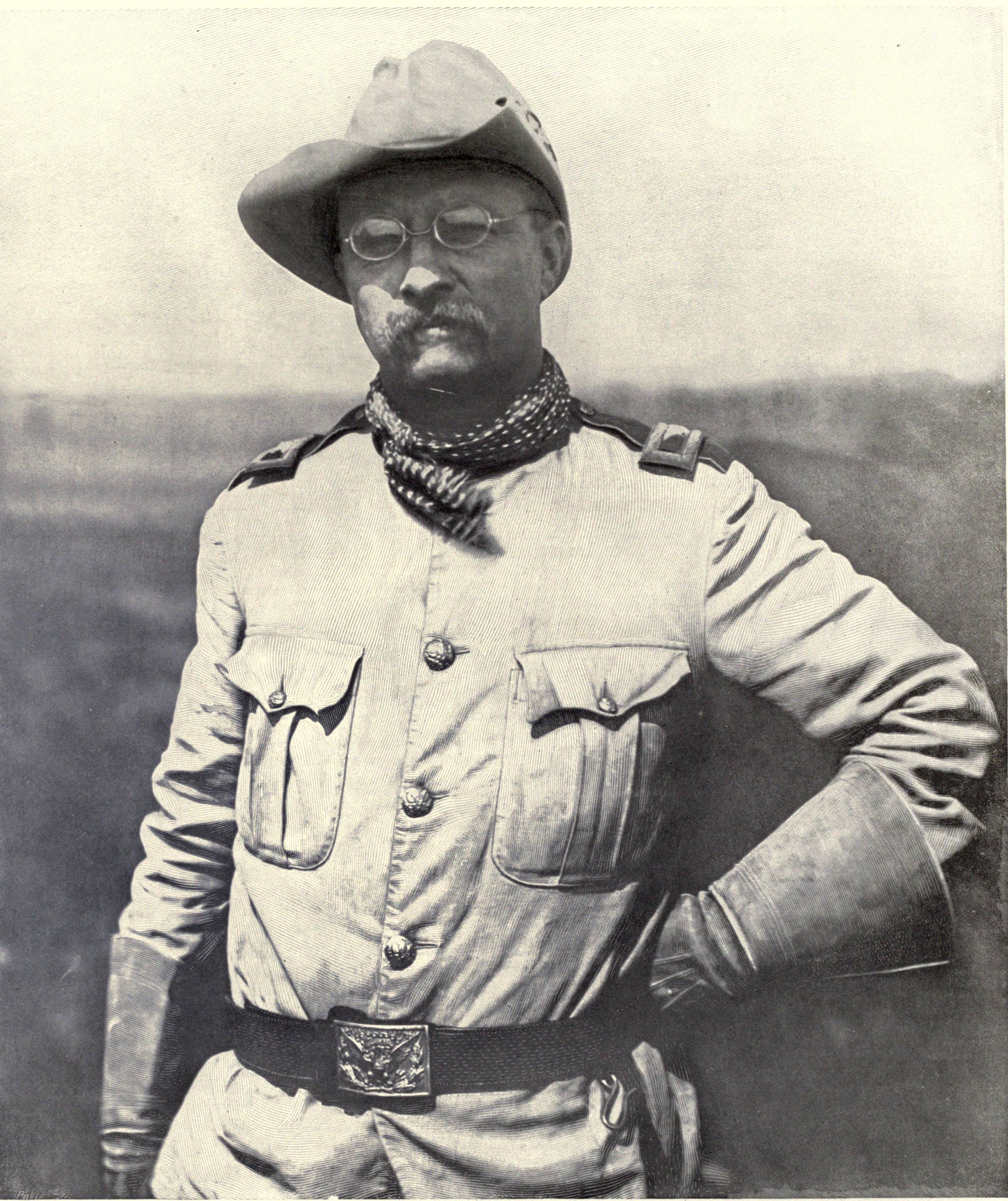 Theodore_Roosevelt_in_Rough_Rider_uniform_in_the_field.jpg